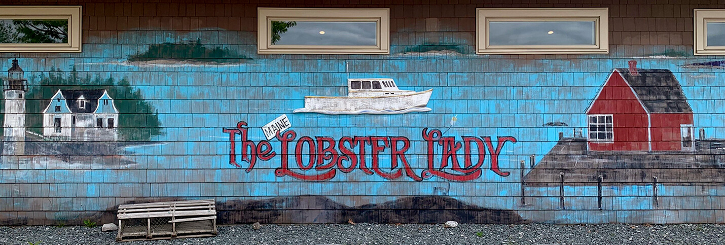 Painted mural on the side of The Maine Lobster Lady restaurant
