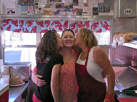 Diana, aka The Maine Lobster Lady, with two of her daughters on the Maine Lobster Lady food truck in Phoenix